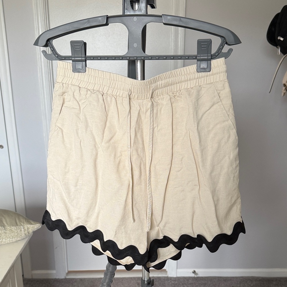 Tie front tan shorts with black detail